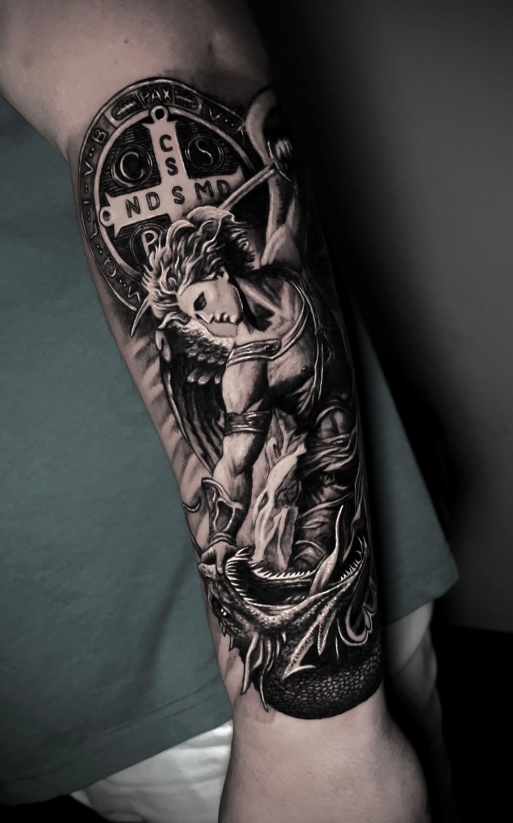 Saint Michael the Archangel with Saint Benedict medal, forearm